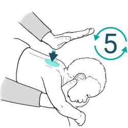 Adult holding baby face-down on forearm, with arrow pointing from heel of raised hand to baby’s upper back.