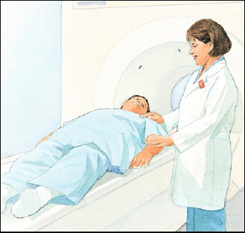 Man lying on back on MRI table. Table is ready to go into MRI tube. Healthcare provider is standing beside man.